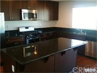 Granite kitchen/ maple cabinets