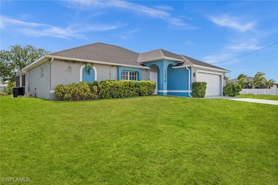 Single story home with concrete driveway, an attac