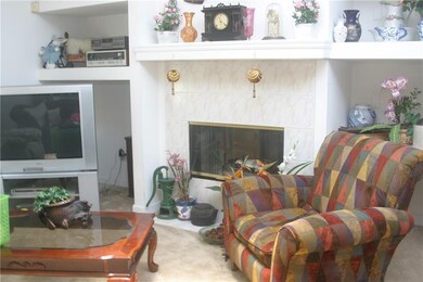 Living room wood burning fireplace.
