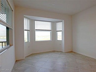 Spare room with healthy amount of natural light an