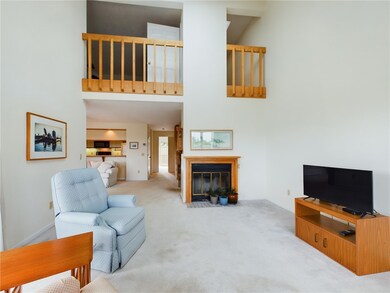 Cathedral ceilings and fireplace, balcony to prima