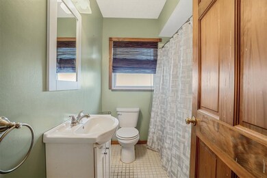 Charming bathroom with a fresh, clean look, featur