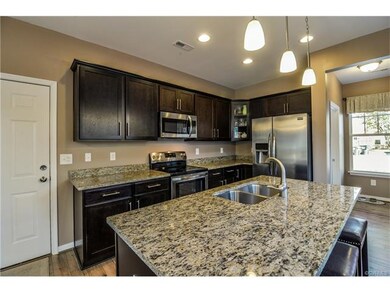 Granite, Stainless, upgraded Cabinetry, Pendant an