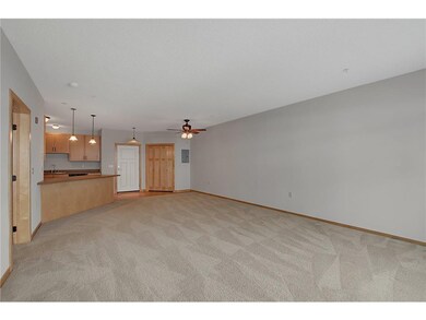 living room facing kitchen/dining