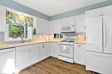 Clean and Bright Kitchen boasts abundant storage.