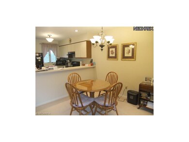 The dinette is located between the living room and