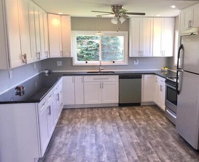 Luxurious kitchen with stainless steel appliances 