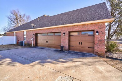 Garage featuring central air condition unit