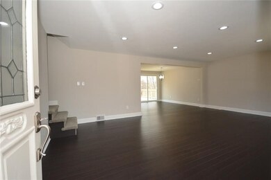 Front door opens up into the open concept living r