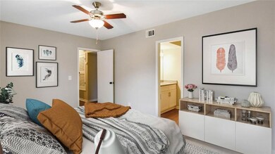 Bedroom with light hardwood / wood-style floors, e
