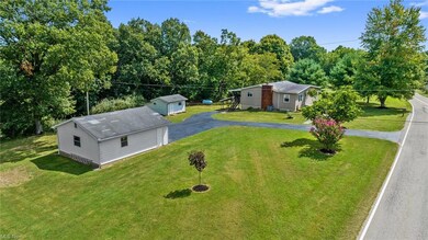 Situated on a 0.92 acre level lot