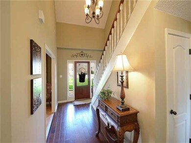 Welcoming 2 story entry w/ updated lighting & new 