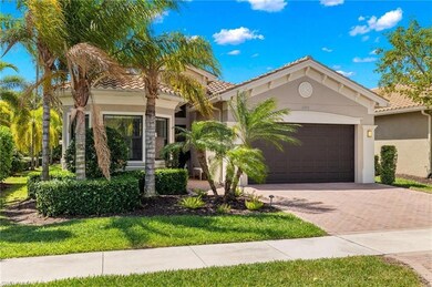 Mediterranean / spanish home featuring a garage