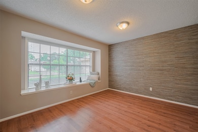 Formal dining room off the entryway, featuring a l