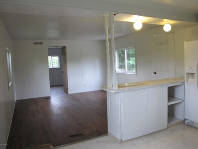 Looking from kitchen to living room