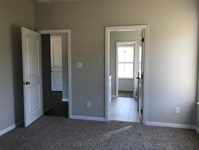 Master suite includes spacious bathroom with walk-