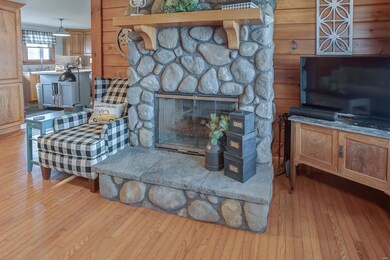Cozy up to the wood burning fireplace.