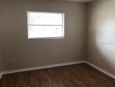 BEDROOM 2. VIEWS OF LARGE YARD. HAS A SECOND WINDO