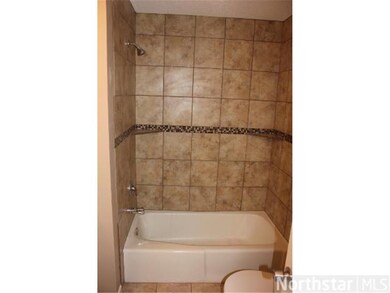 Stunning Shower & Tub Surround is entirely Tiled w