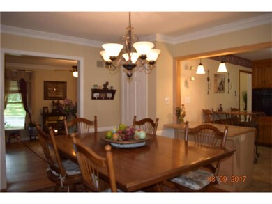 Dining is open to kitchen and family room