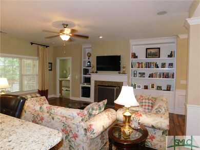 Family room with gas fireplace, built in bookshelv