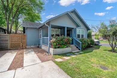 Bungalow featuring fence, crawl space, a front ya