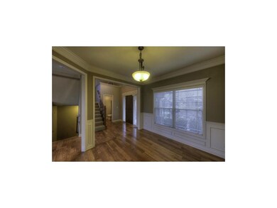 Formal dining room with crown molding and beautifu