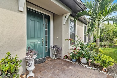 Doorway to property with stucco siding