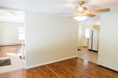 The dining room abuts the kitchen...