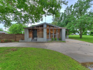 Mid-century inspired home featuring concrete circl