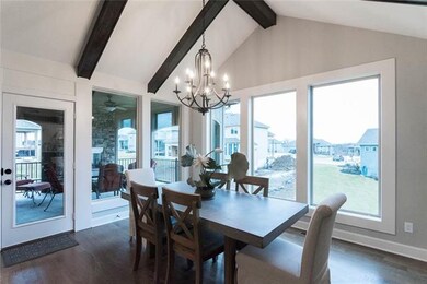 Dining Room Features Hardwood Floors, Vaulted Ceil