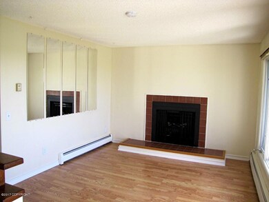 Living room w/fireplace.