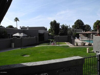 Patio view to Pool & grassy play area