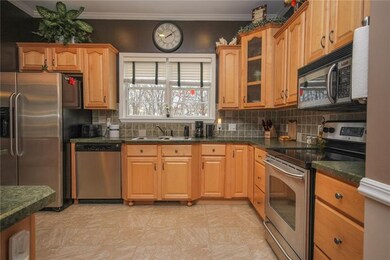 Plenty of cabinets, stainless steel appliances.