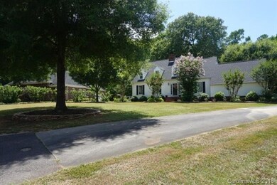 Long driveway with very large front yard