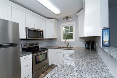 Remodeled Kitchen with New Cabinets, Granite & SS Applainces