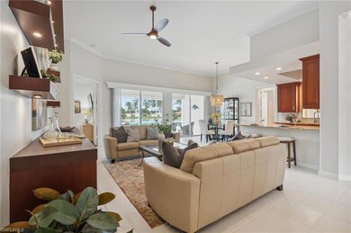 Living room featuring light tile patterned floors,