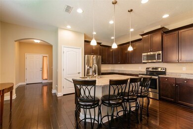 Kitchen looking toward entryway.