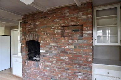 Brick wall with fireplace in breakfast nook 