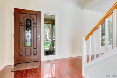 Foyer featuring wood-type flooring