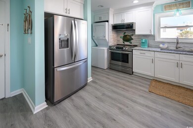Kitchen featuring appliances with stainless steel 