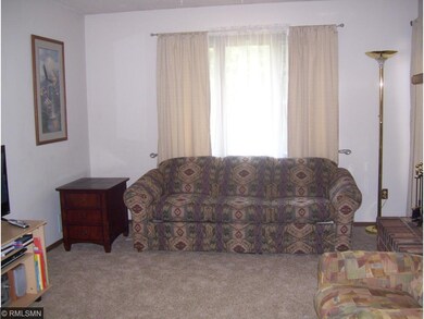 Living room has large wall to left here that works