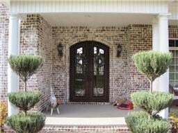 Stately and Beautiful Oil Rubbed Bronze Doors  The glass windows open inside for easy cleaning.