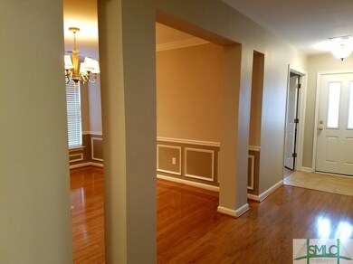 Columned entrance to Formal Dining Room with upgra