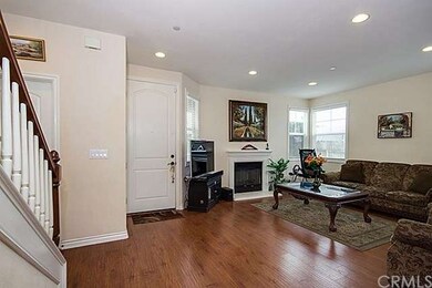 Large Entry with Wood Flooring & Custom Paint