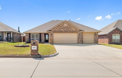 Ranch-style house featuring a front lawn, concrete