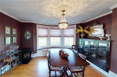 Dining Room with Large Bay Window and Built In Cab