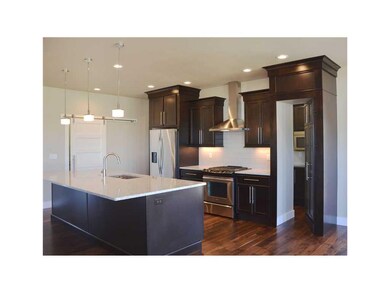 . Hidden Pantry with microwave, countertop and sto