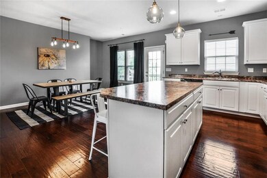 Kitchen and Dining space with high-end lighting fi
