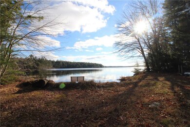 Beach and dock on Alford Lake is...